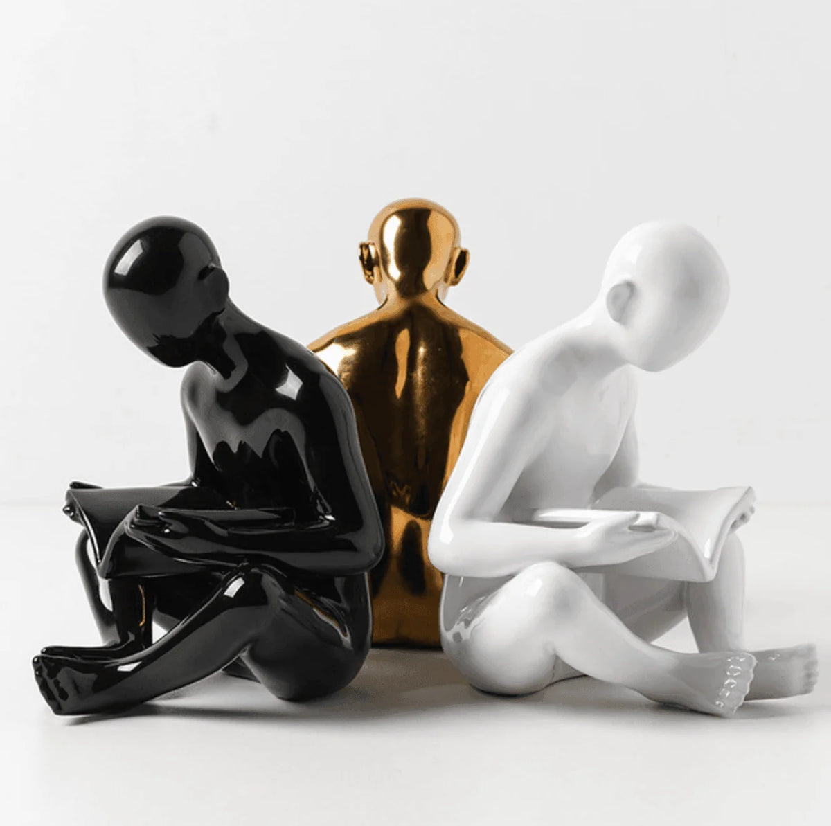 Sculptura Bookend | Nordic Resin, Seated Reading Man Design 2
