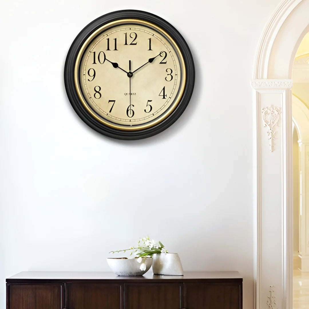 Vintage wall clock above a table lamp