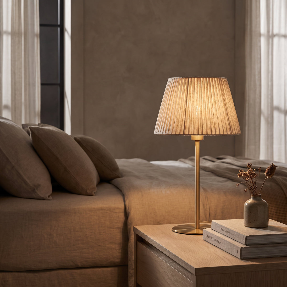 Pleated shade table lamp lit on an oak nightstand in a warm bedroom, Style Room