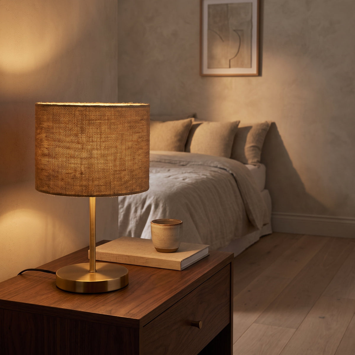 Jute shade table lamp lit on a walnut nightstand in a warm bedroom, Style Room