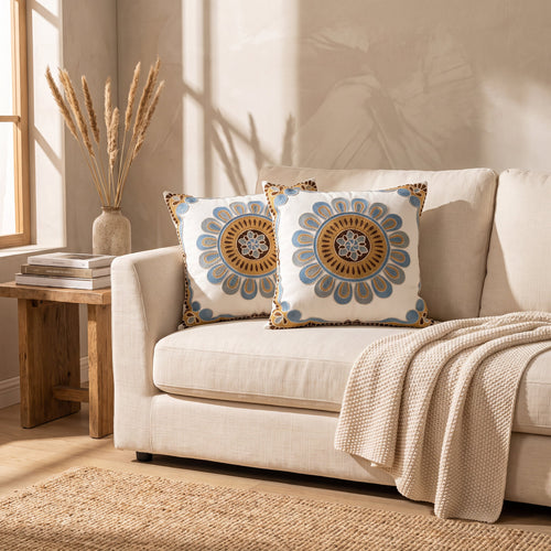 Aurelia embroidered cushions on a cream linen sofa, Style Room