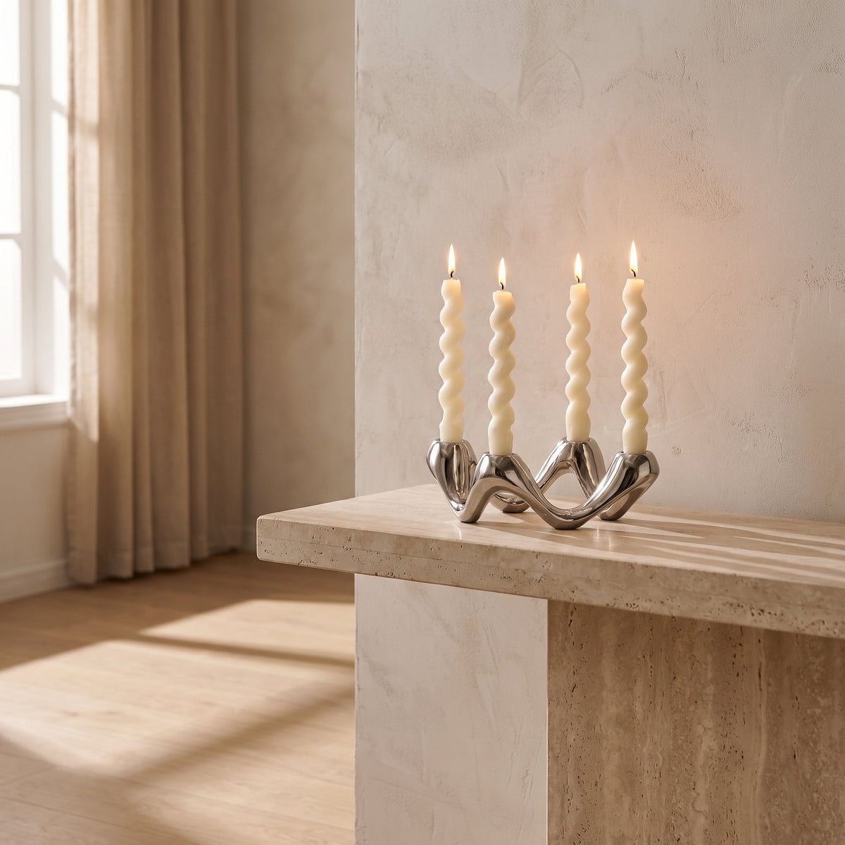 Celora silver candle holder lit on a console in a calm interior, Style Room