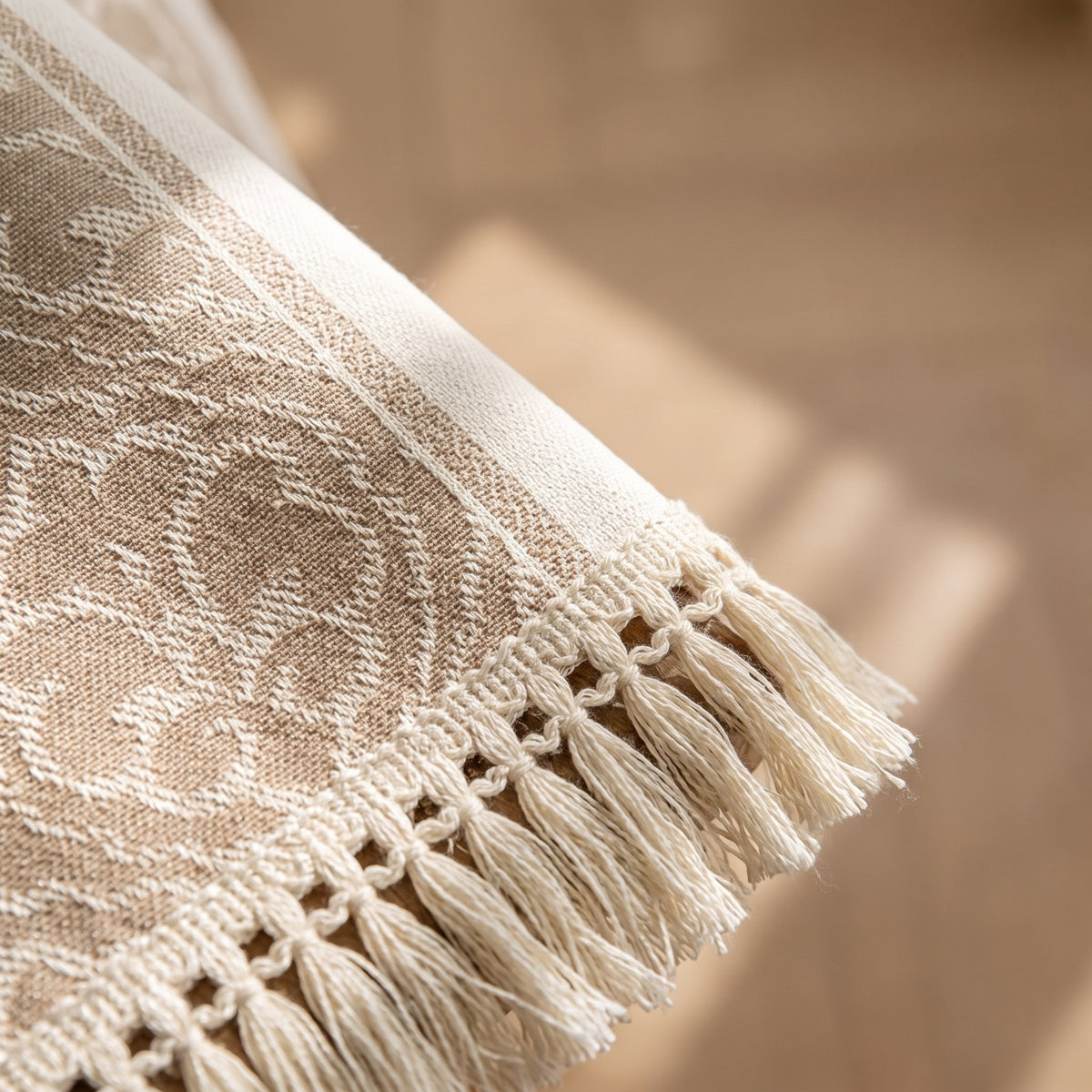 Close-up of the damask weave and tassel fringe of the Dune runner, Style Room