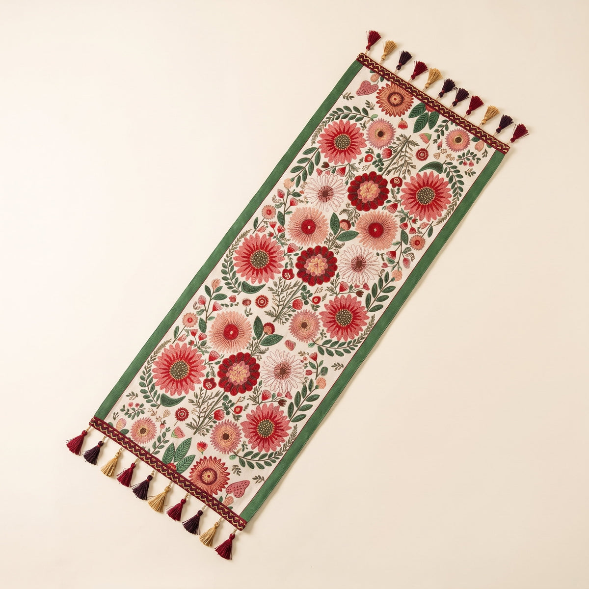 Elysia floral embroidered table runner laid flat with multicoloured tassels, full view