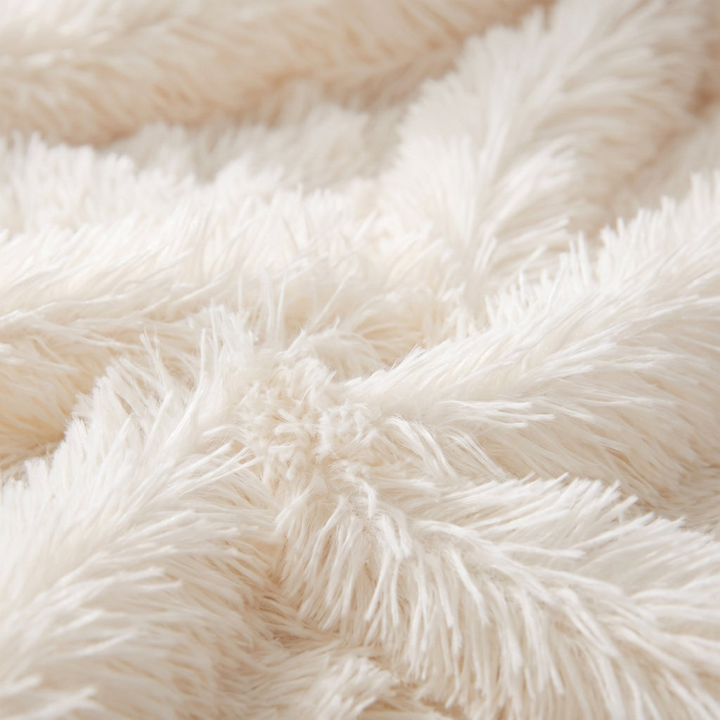 Close-up of the long ivory faux fur pile of the Fiona throw, Style Room
