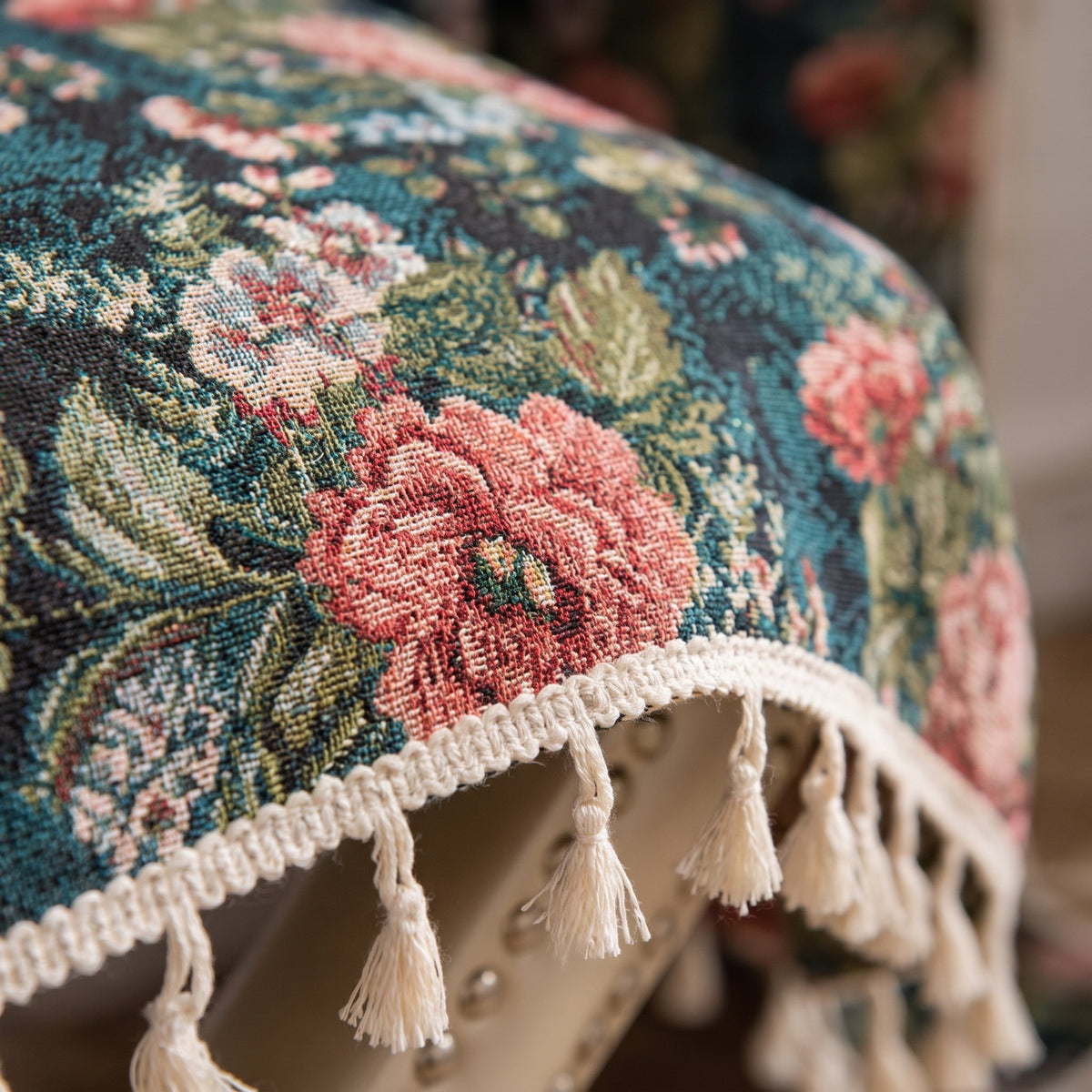 Close-up of the rose print and pom-pom trim of the Flora curtain, Style Room