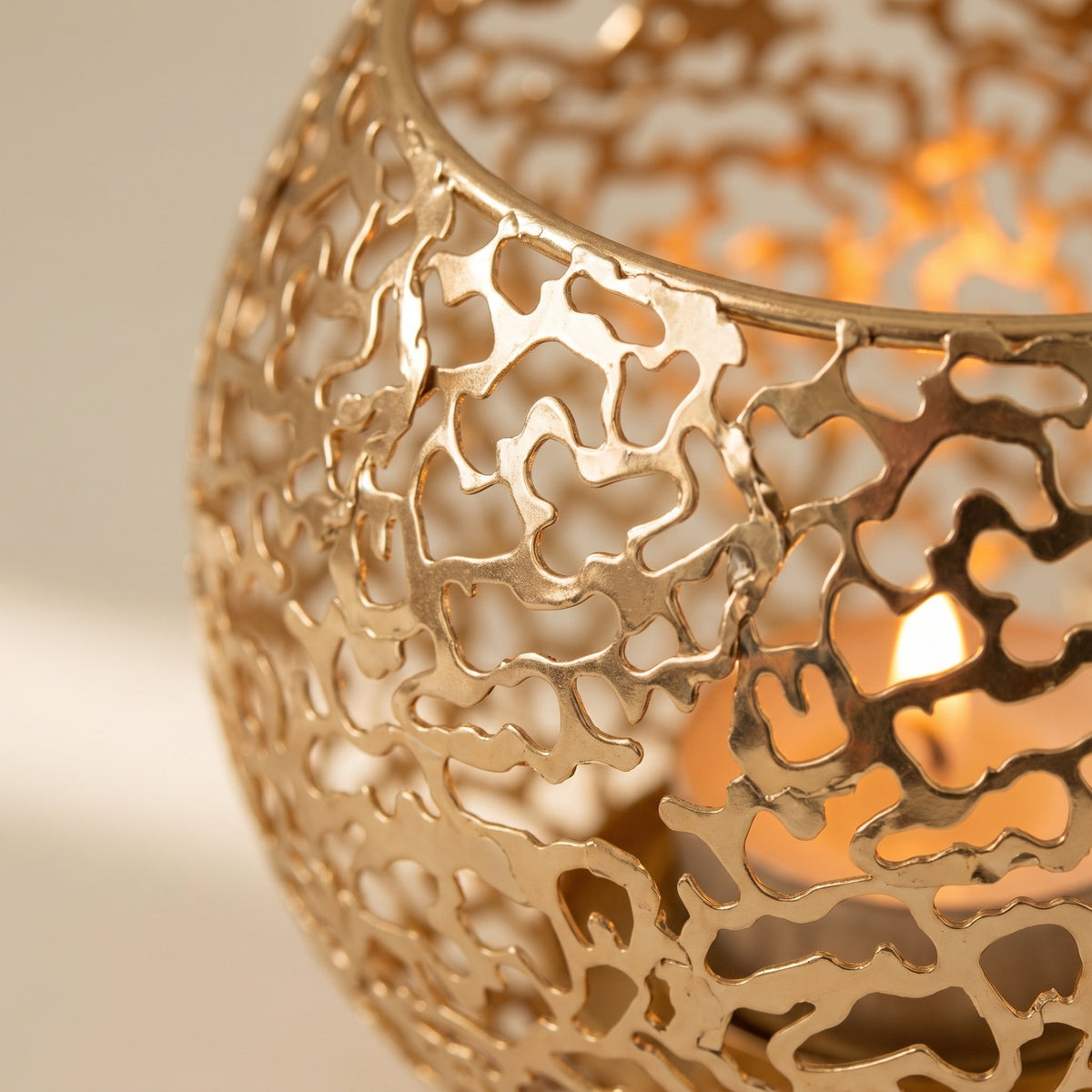 Close-up of the pierced filigree of the Gleam sphere holder, Style Room