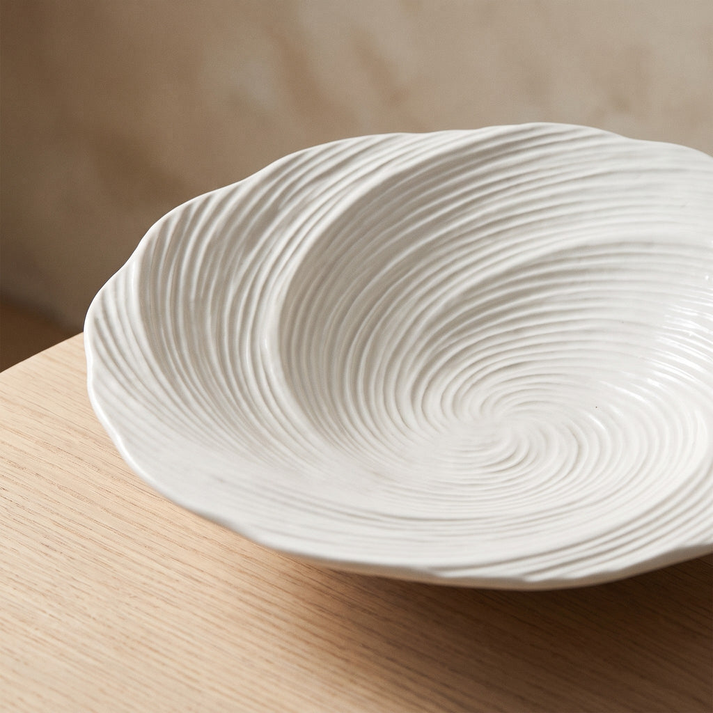 Imara white ceramic serving plate with swirled ridges, view 4