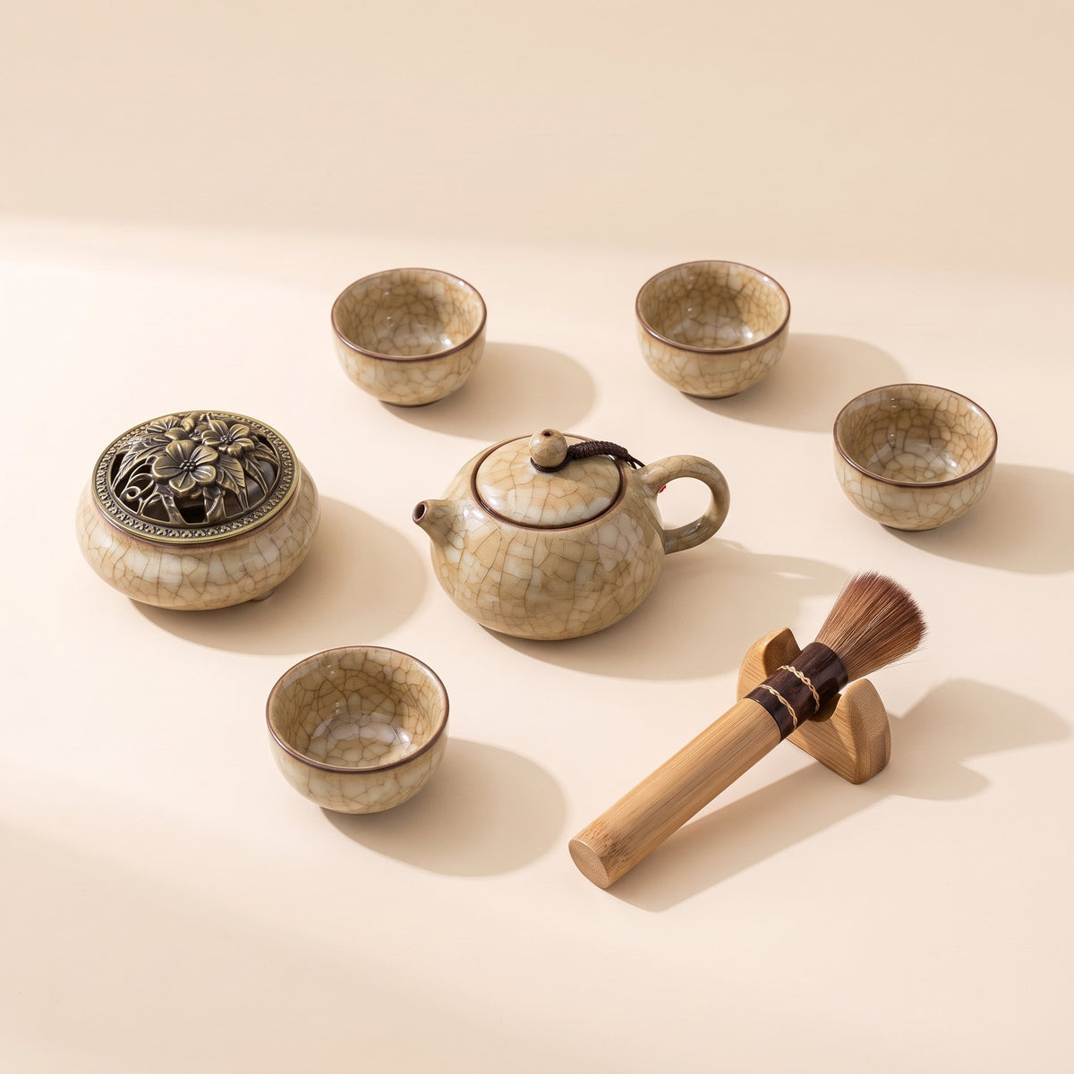 Lotus ceramic tea set in the sand crackle glaze, all seven pieces laid out, Style Room