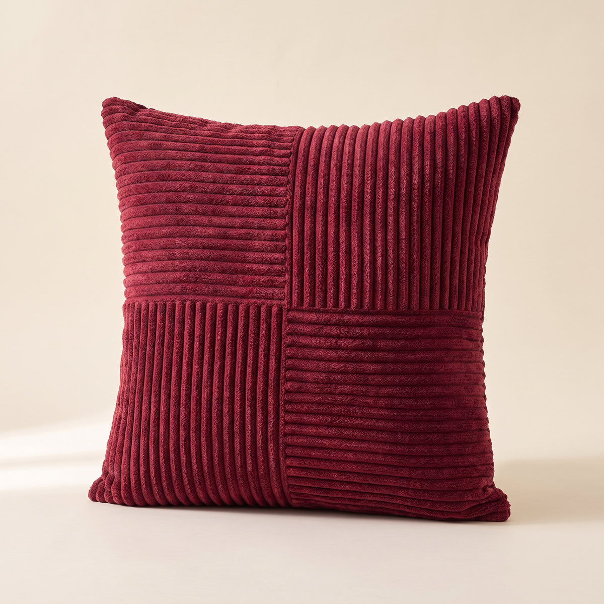 Raven cushion cover in maroon corduroy with wide-wale patchwork ribbing, Style Room