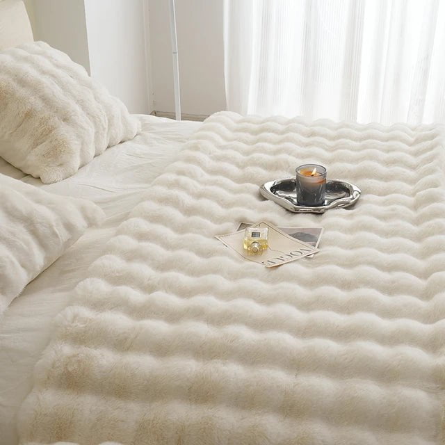Raven faux-fur throw shown folded, close view of the pile