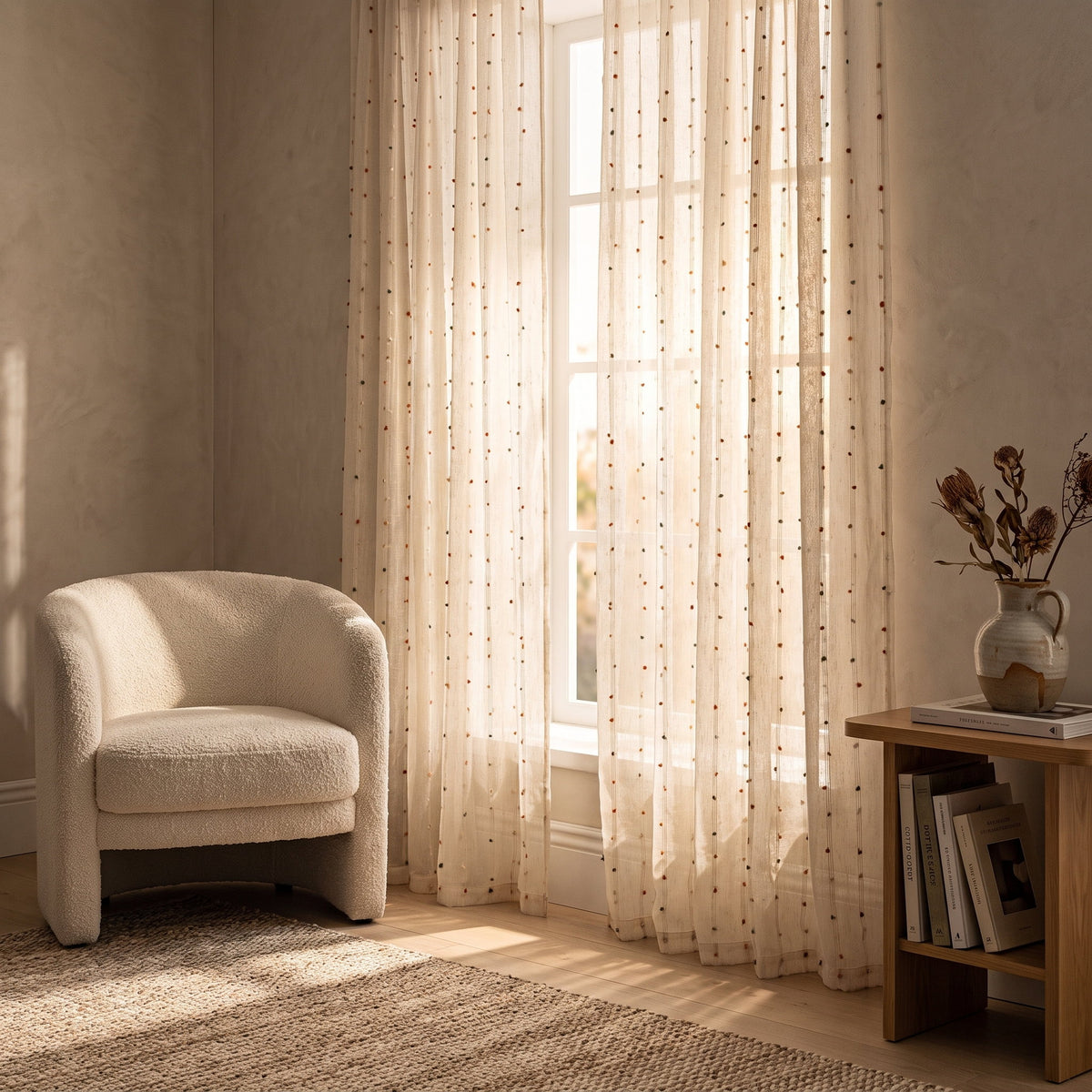 Sable pom-pom curtains hanging at a tall window, Style Room