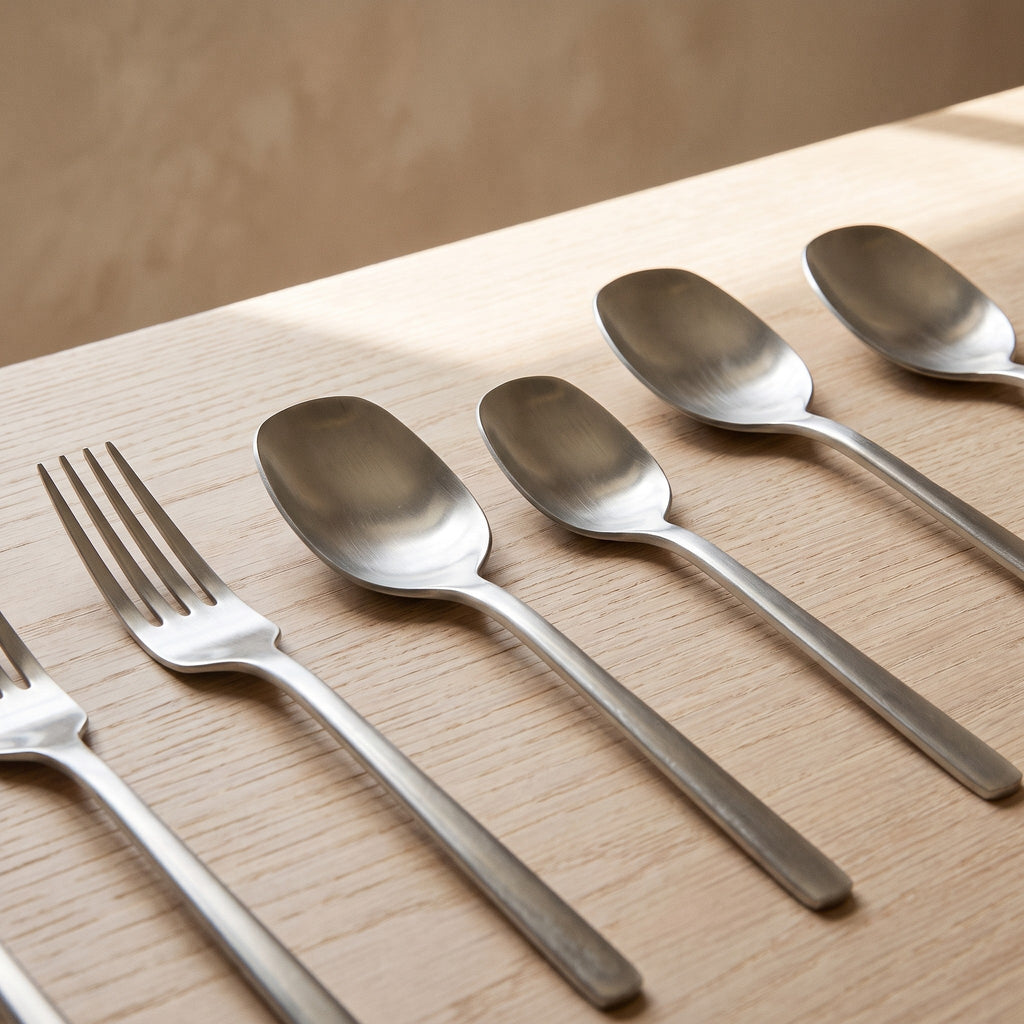 Sierra cutlery in black on a neutral table setting