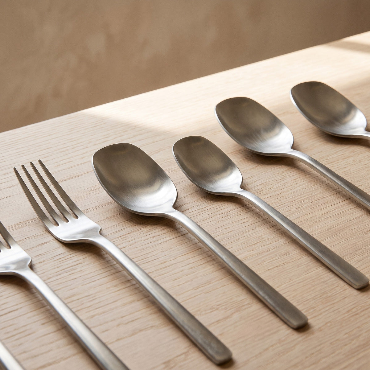 Sierra cutlery in black on a neutral table setting