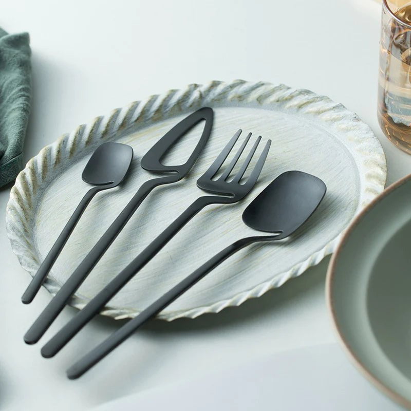 Sierra cutlery in gold arranged on a plate