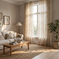 Sitting room with Wren meadow cream embroidered curtains at a tall window, Style Room